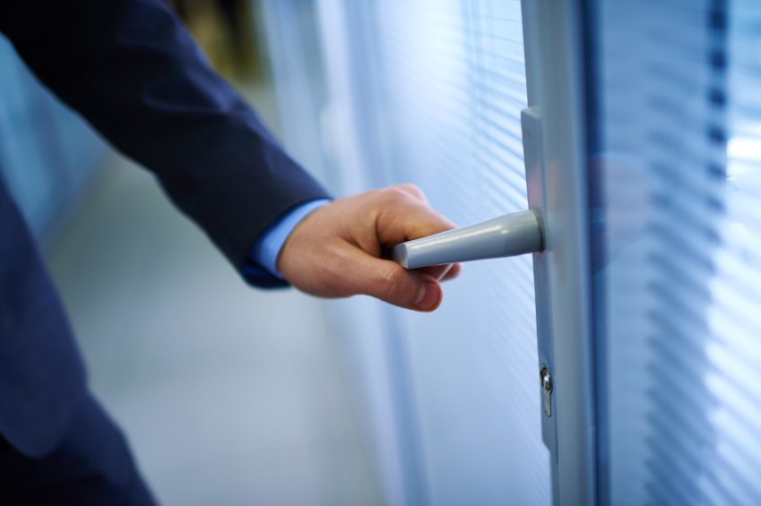 hand opening office door